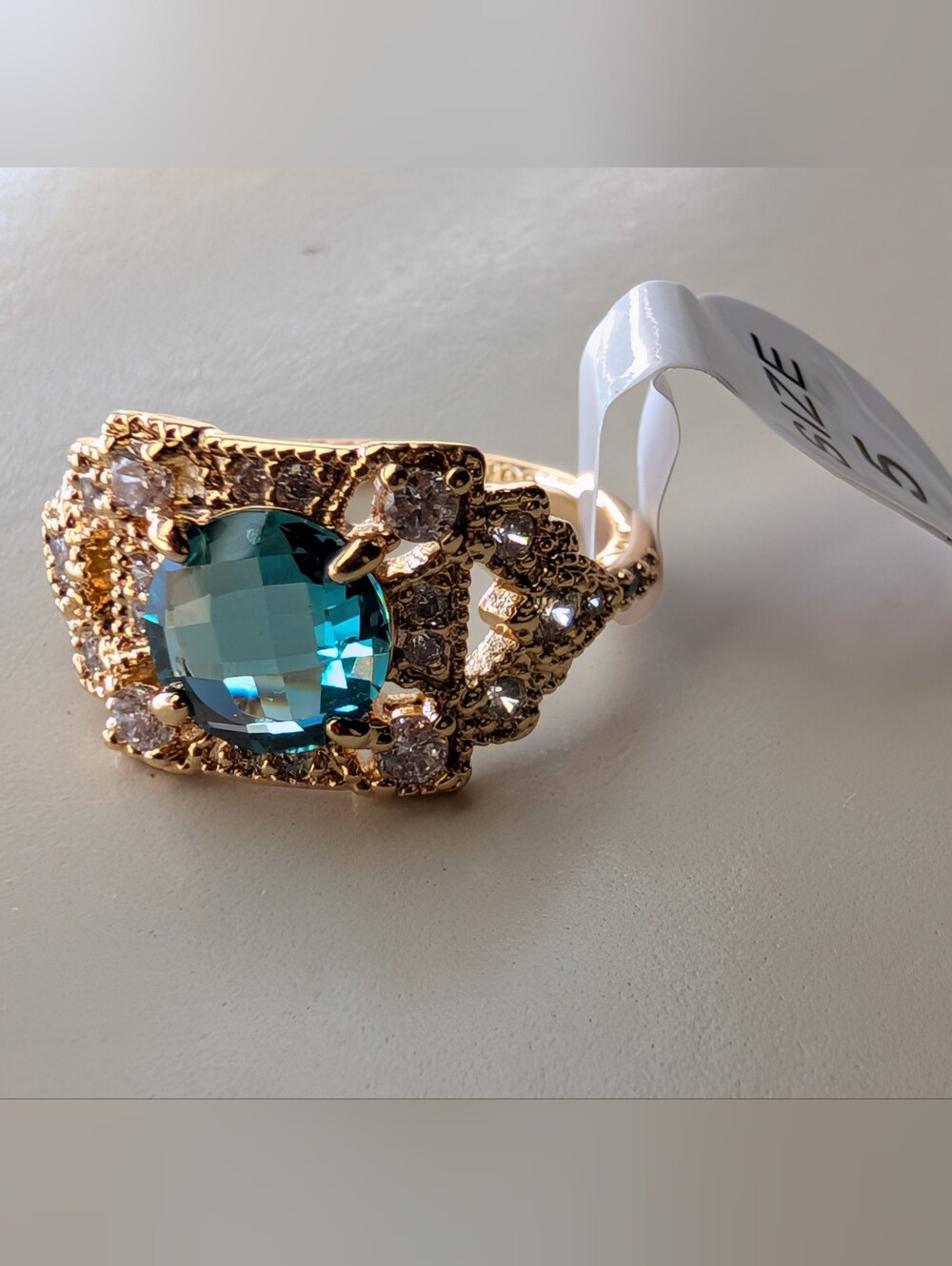 Bomb Party Paraiba Tourmaline on Gold plating - Size 5